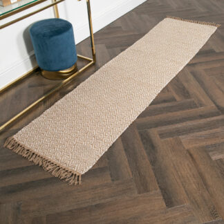 This Geometric Jute & Cotton Runner Rug will bring an Aztec, geometric look into any home, it is made from a mix of woven jute and cotton. At each end of the rug, you will find fringed edges, adding to the bohemian look. Jute and cotton are sustainable fibres, and our rugs are an easy way to soften hardwood floors. 